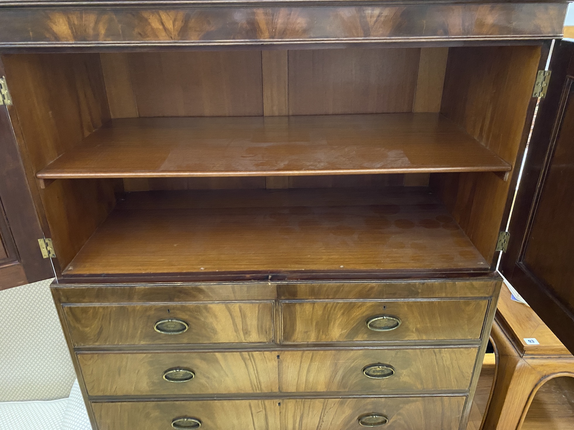 An Edwardian George III style mahogany cupboard on chest, width 106cm, depth 53cm, height 186cm